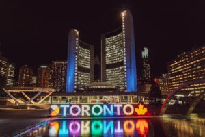 downtown Toronto with the Toronto sign lit up at night